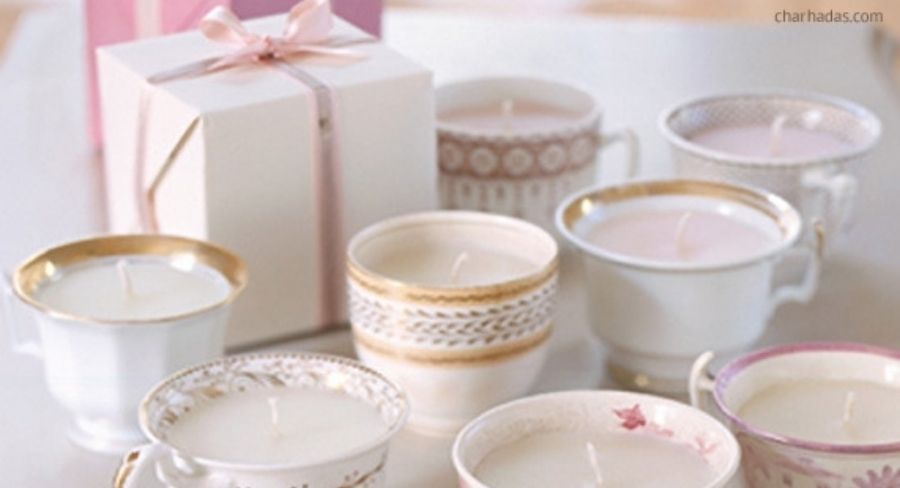 Velas en taza de té vintage