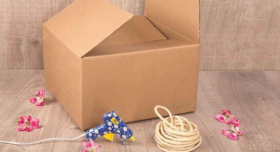 convertir una caja de cartón en una canasta para decorar